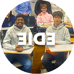 undergraduate students sit together in a classroom